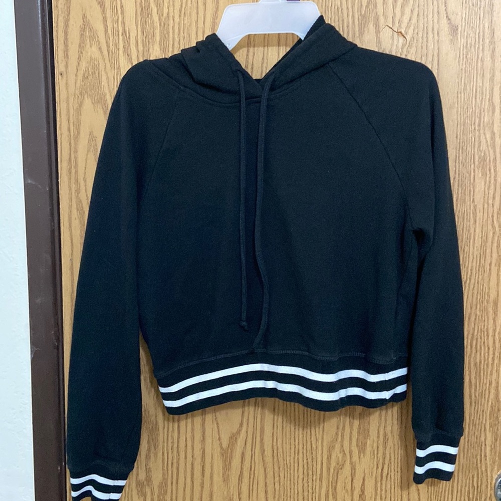 Cute hooded sweater size medium. No holes comes from smoke free home.
